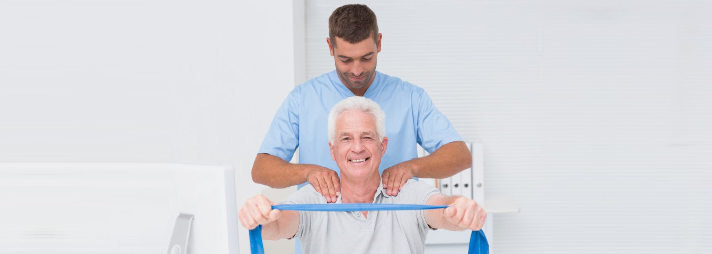 caregiver assisting his patient